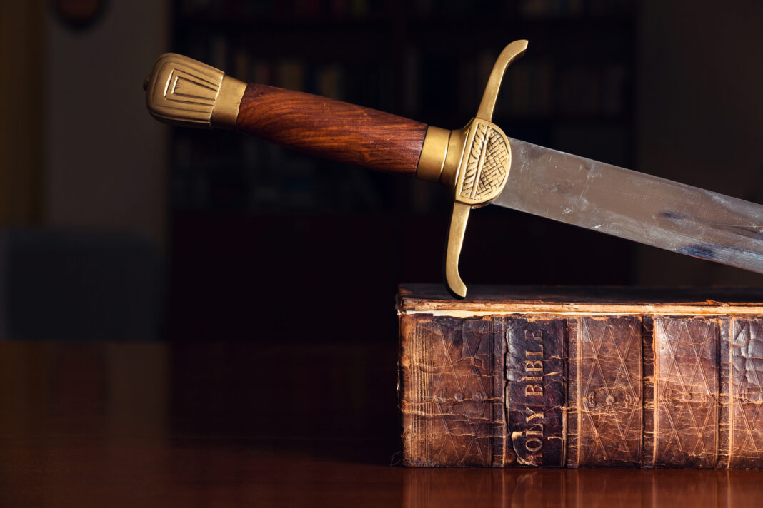 sword on old bible