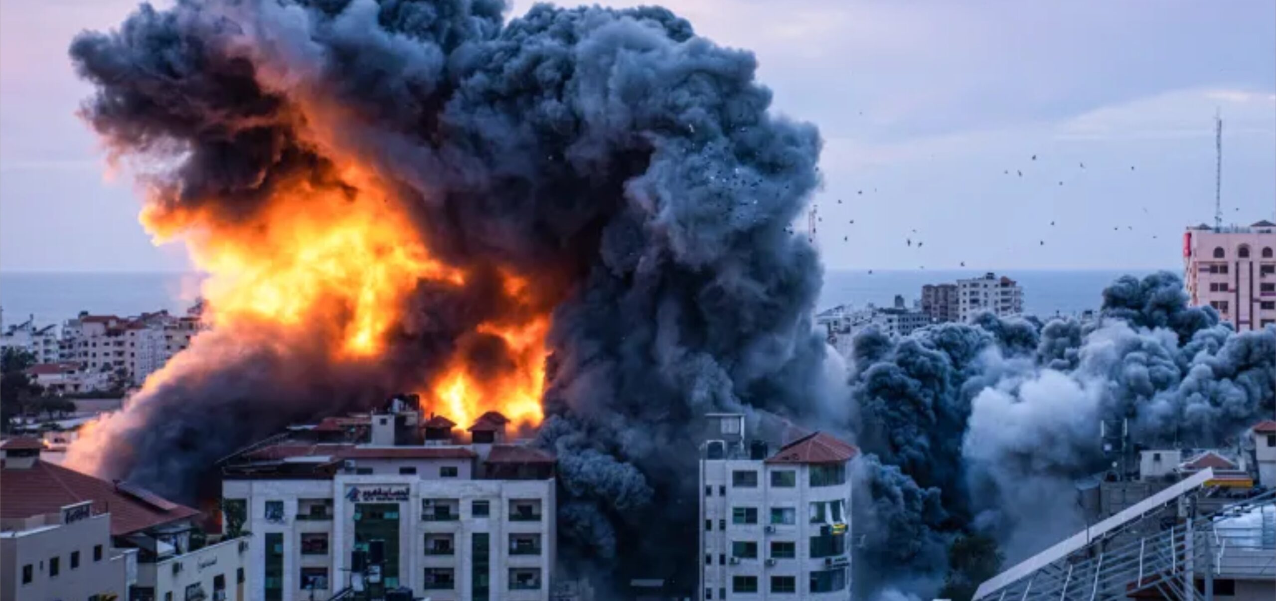 Fire and smoke rises following an Israeli air raid in Gaza City