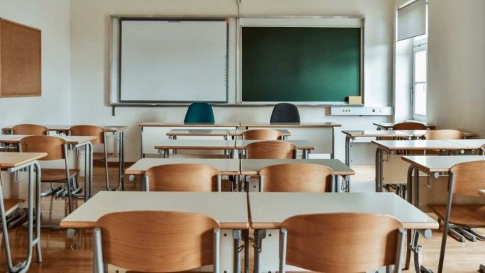 empty school classroom with green chalkboard 1024x653 2