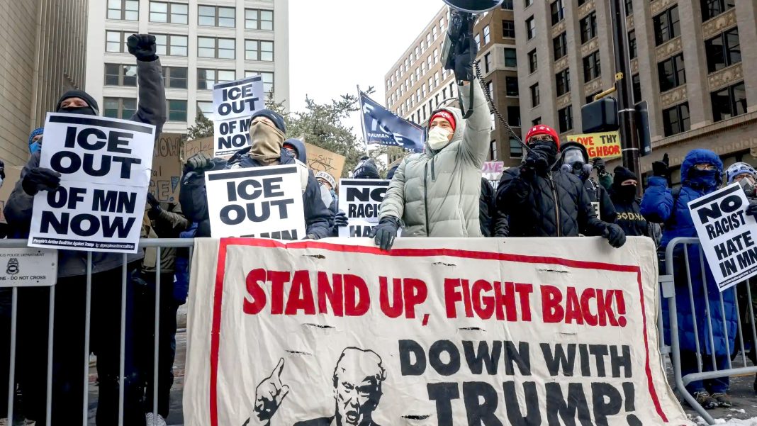 16b2ab 20260117 protesters chant and hold signs webp2000