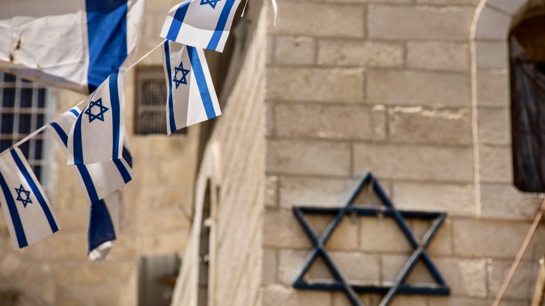 israeli flag blowing in the wind 2025 03 08 05 22 51 utc scaled 2