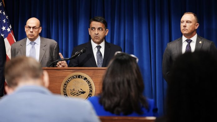 35221a 20261007 three people speaking at a press conference 2000 2